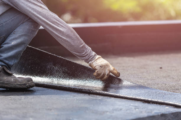Professional Basement Waterproofing technician working in Coopersville, MI